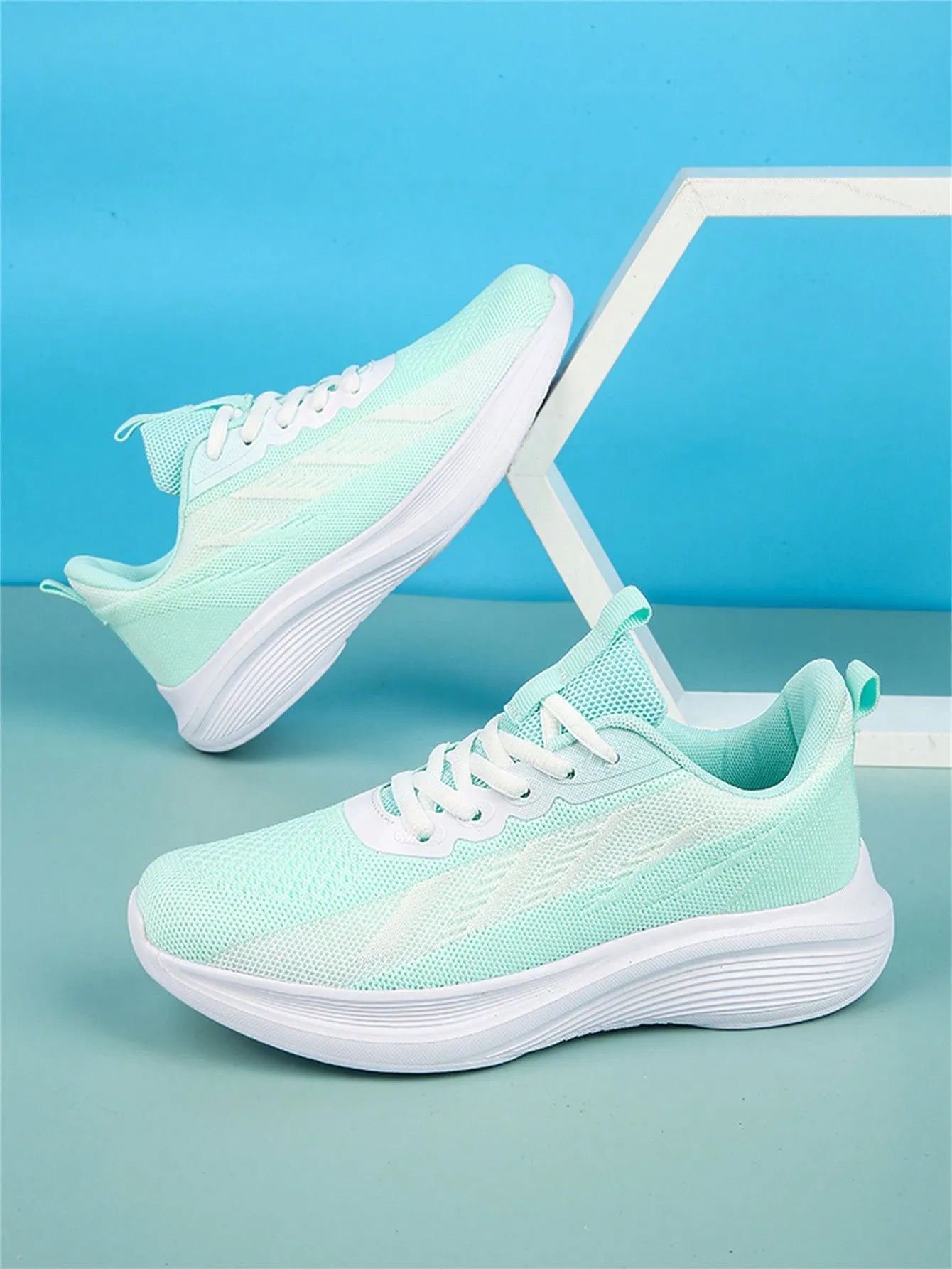 Knitted Upper Thick Sole Running Shoes