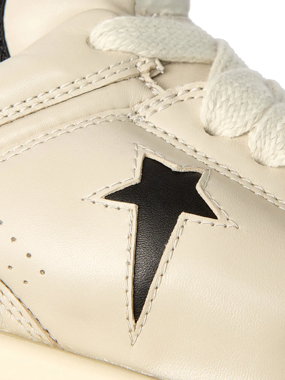 Konversera x drkshwd turbowpn ox läder sneakers