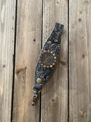 LV Tooled Leather Wristlet Strap