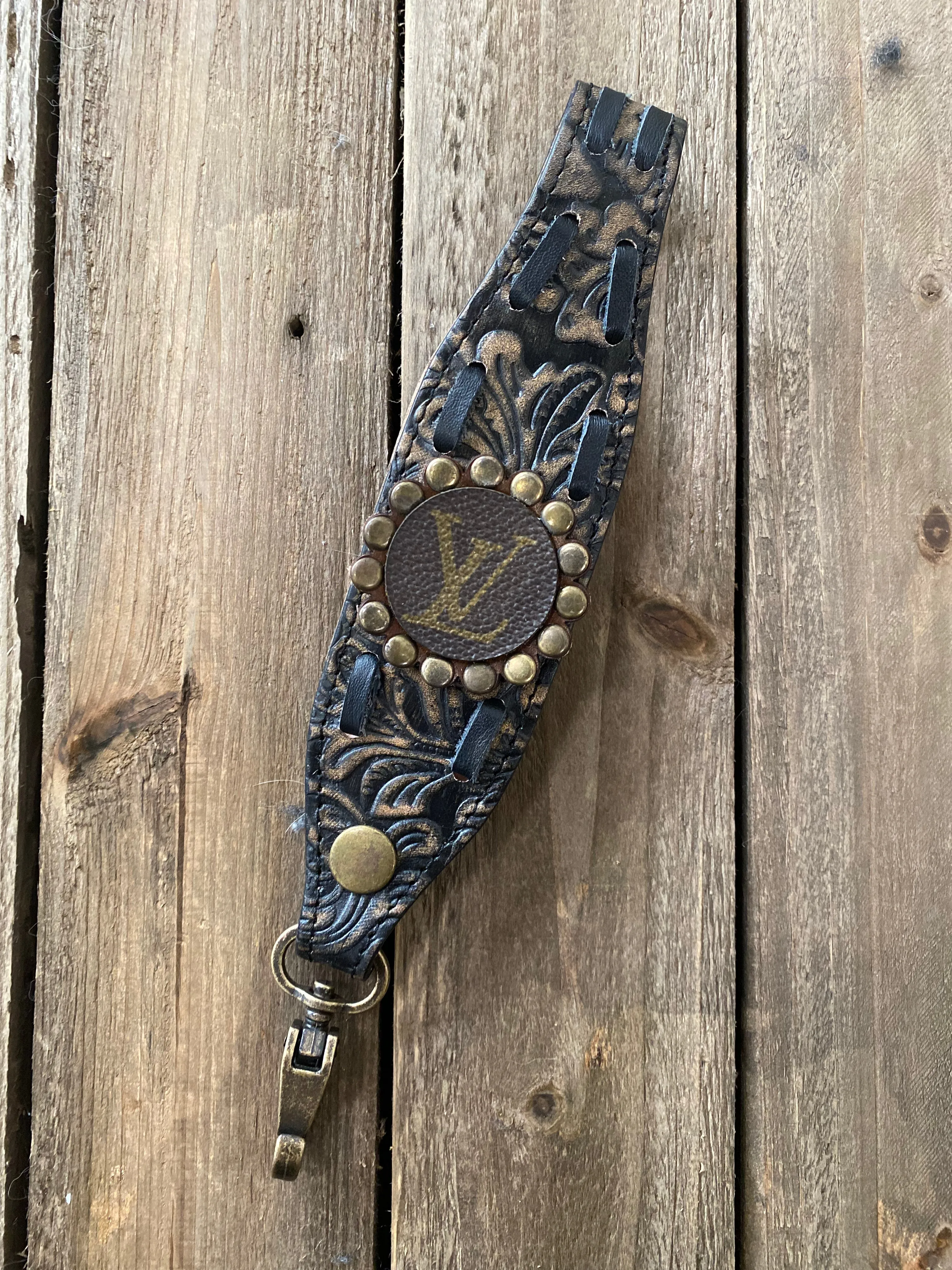 LV Tooled Leather Wristlet Strap