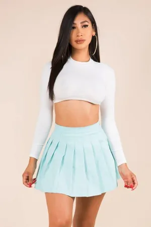 PLEATED SOLID COLOR MINI SKIRT WITH LINING SHORTS