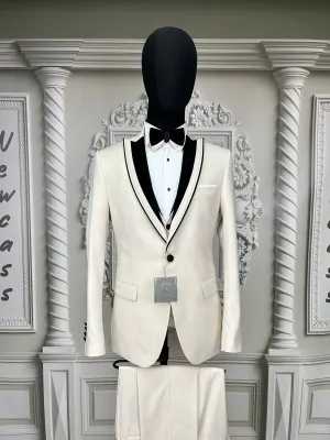 Single Button Three Pieces Tuxedo Suit with contrasting green velvet Lapel, matching bow tie and Black Pants.