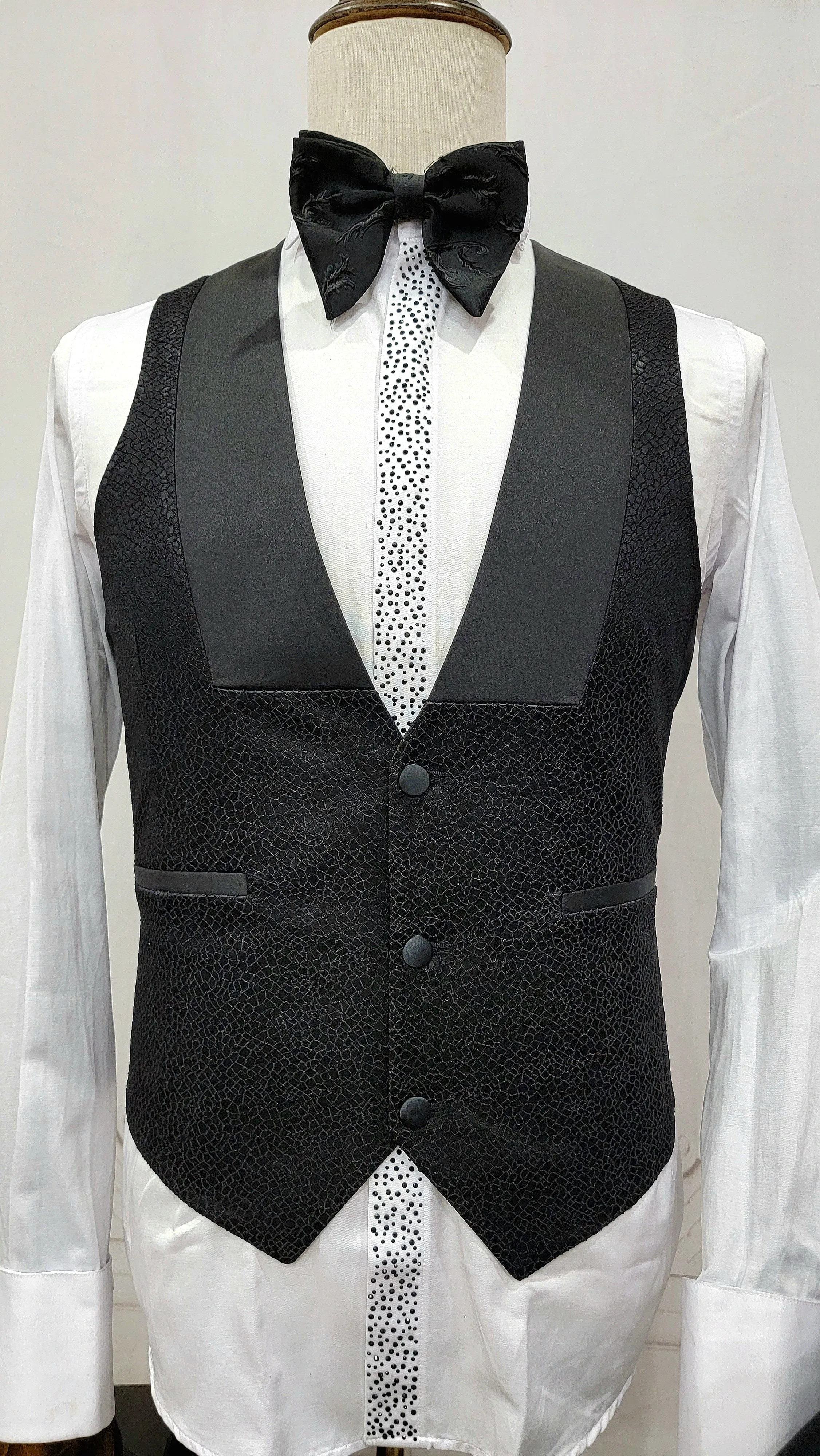 Three Piece Tuxedo Suit with Black velvet accented Lapel and Pants.