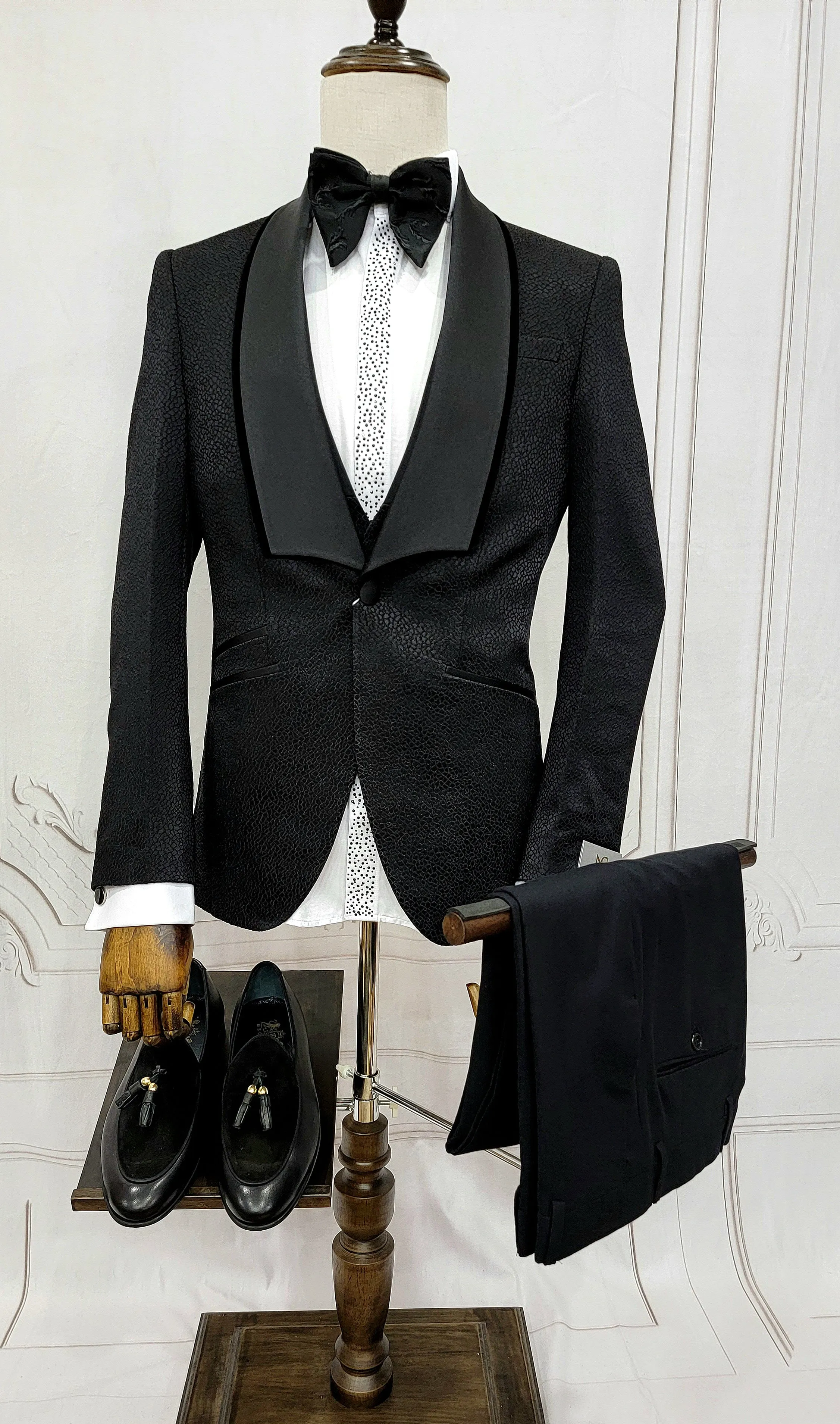 Three Piece Tuxedo Suit with Black velvet accented Lapel and Pants.